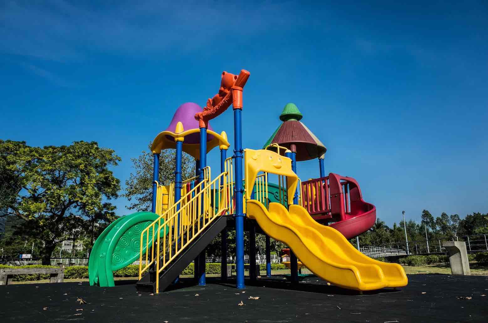 Colorful children's playground with equipment and play areas for kids